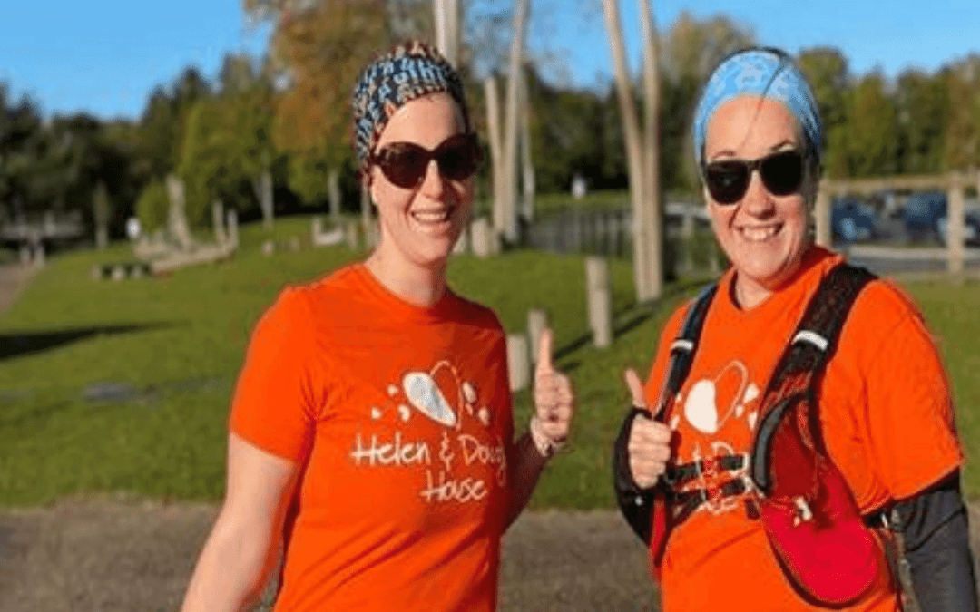 two women with orange HDH tshirts smiling_1500x800